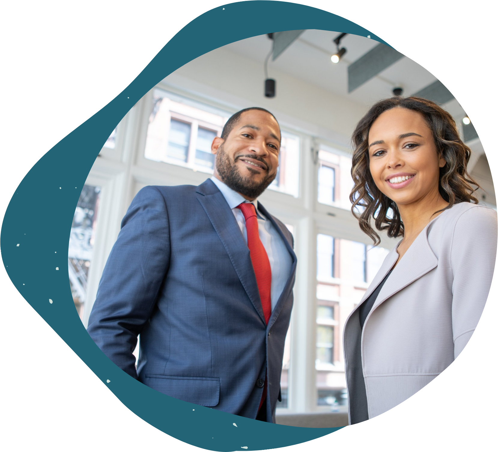 Careerleaf Corporate header image with man and woman wearing business suits looking down at camera in office